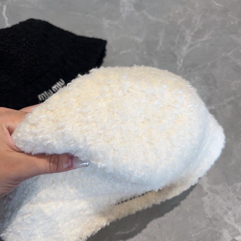 MiuMiu Bucket Hat