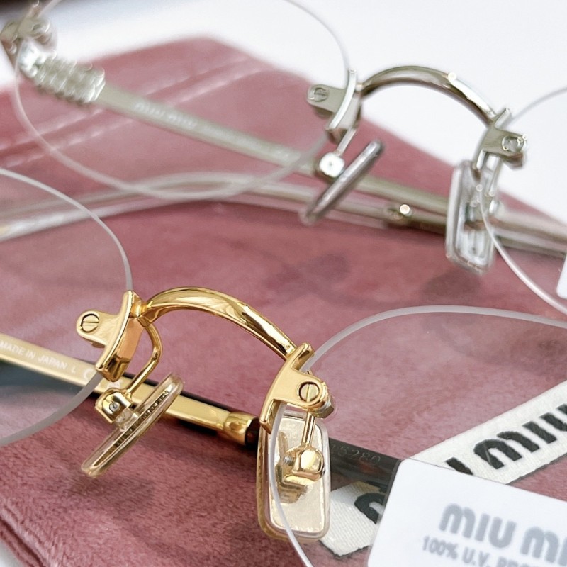 MiuMiu Sunglasses 